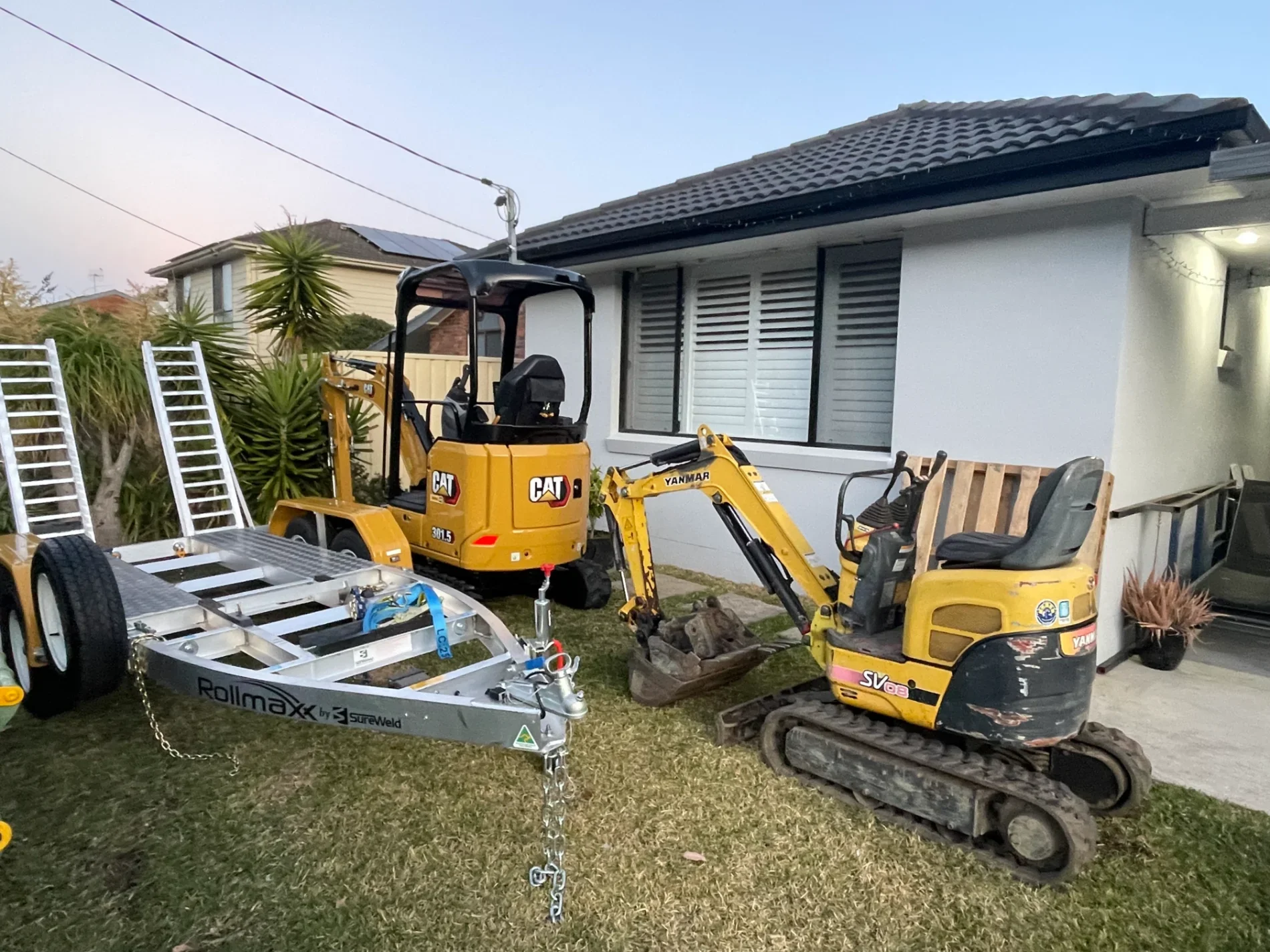 CAT and Yanmar mini excavators with Rollmaxx trailer ready for tight access excavation on the Central Coast