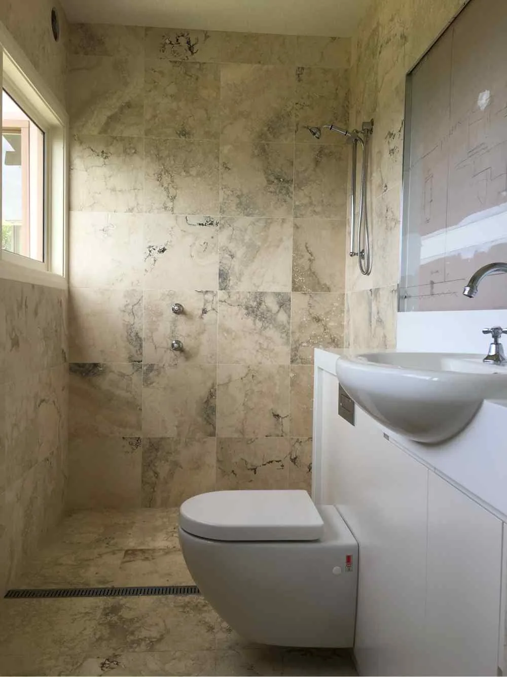 Completed marble bathroom renovation by AH Plumbing & Maintenance in Gosford